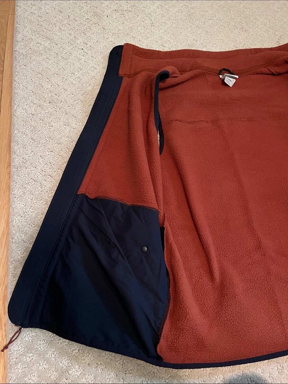 The North Face: Men's Burnt Orange Fleece Vest with Contrast Trim
